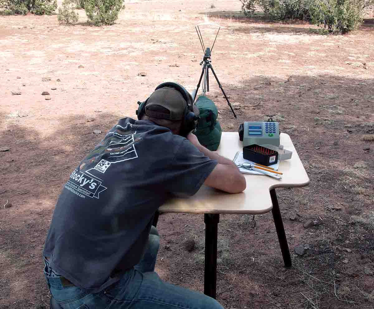 The bench top has cutouts for both left- and right-handed use, the legs are tall enough for shooter comfort, and the tripod support works well on uneven terrain.